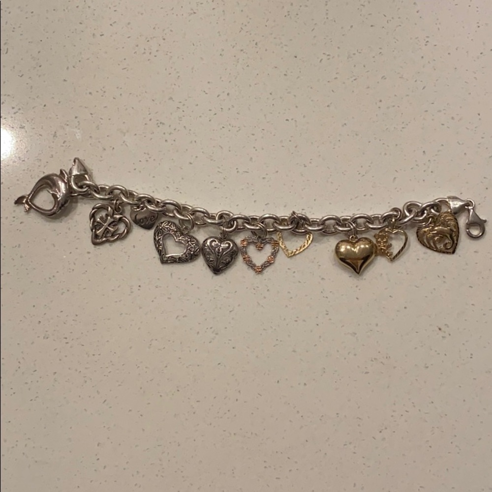 Gold and silver 10 heart shape charms bracelet